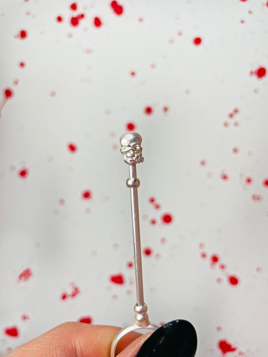 Skull J Holder